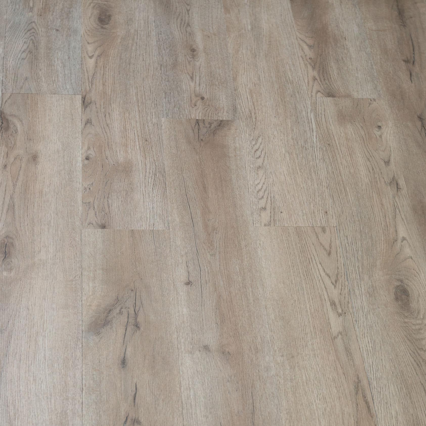 Arroyo Dune Powell Plus 2mm Fiberglass Gluedown Luxury Vinyl Flooring — angled close-up of the plank surface texture, Bering Floors & Coverings, SKU 11006-0105