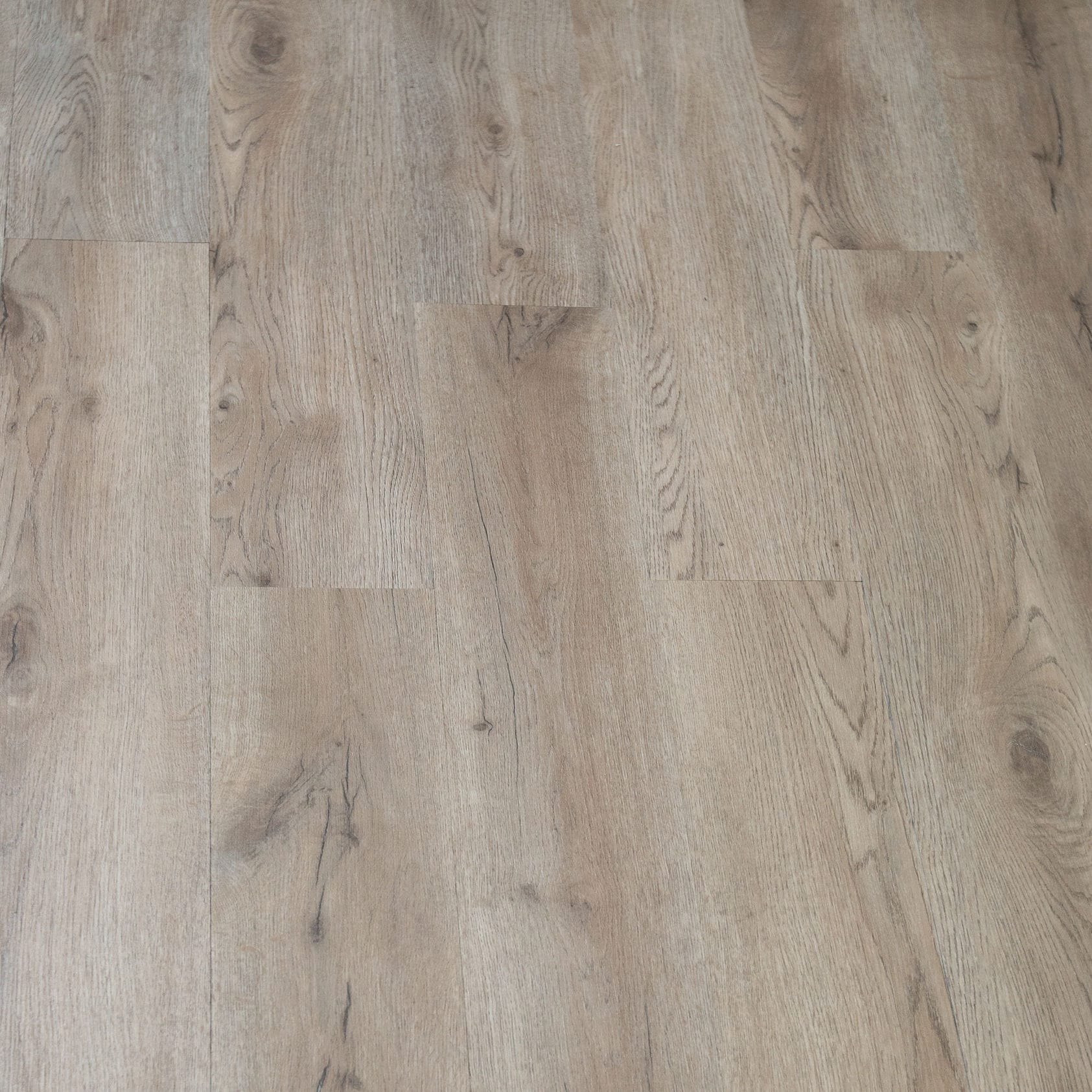 Arroyo Dune Powell 2mm Gluedown Luxury Vinyl Flooring installed in a kitchen with bar stools, Bering Floors & Coverings, SKU 11001-0105