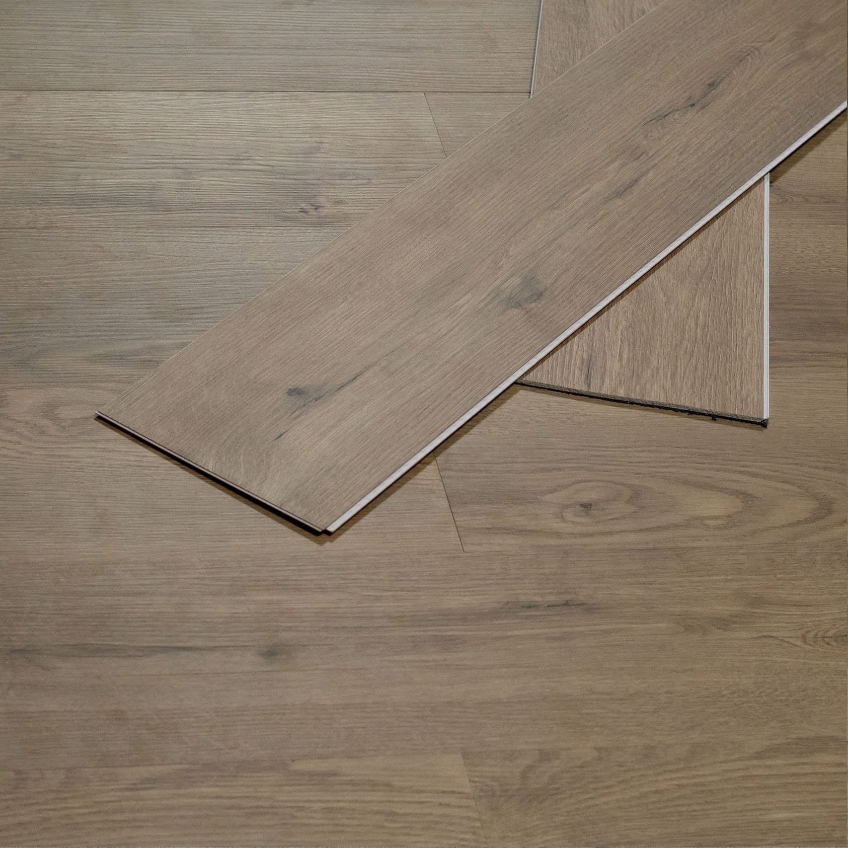 Walden Grove Tristao SPC Flooring — close-up of a loose plank showing the plank edge profile, Bering Floors & Coverings, SKU 12001-0201