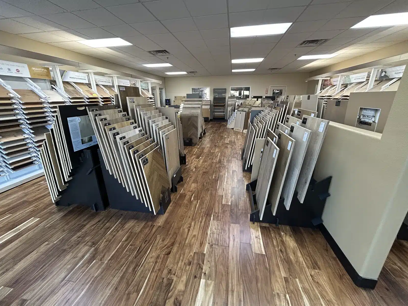 Wide view of the Cloud Floor and Home wood showroom with flooring sample displays